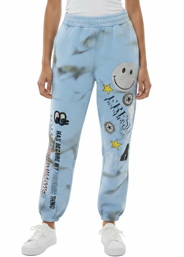 GRAPHIC CUFFED  SMILEY JOGGER PANTS BY ANGELA