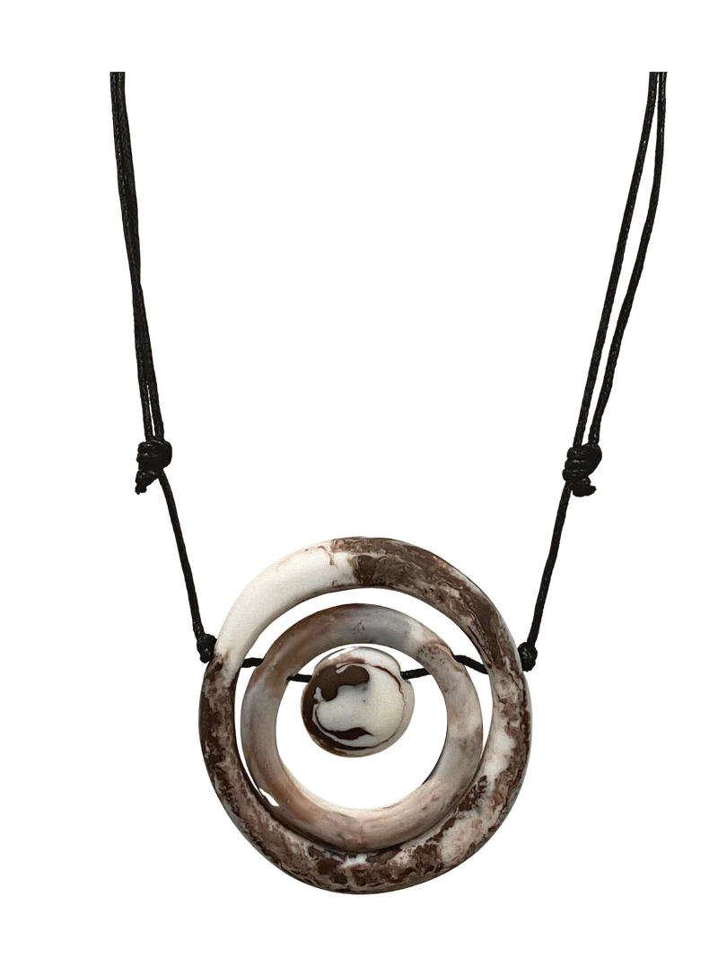 Elevate your ensemble with our GEENA White, Brown and Black Resin Spiral Necklace