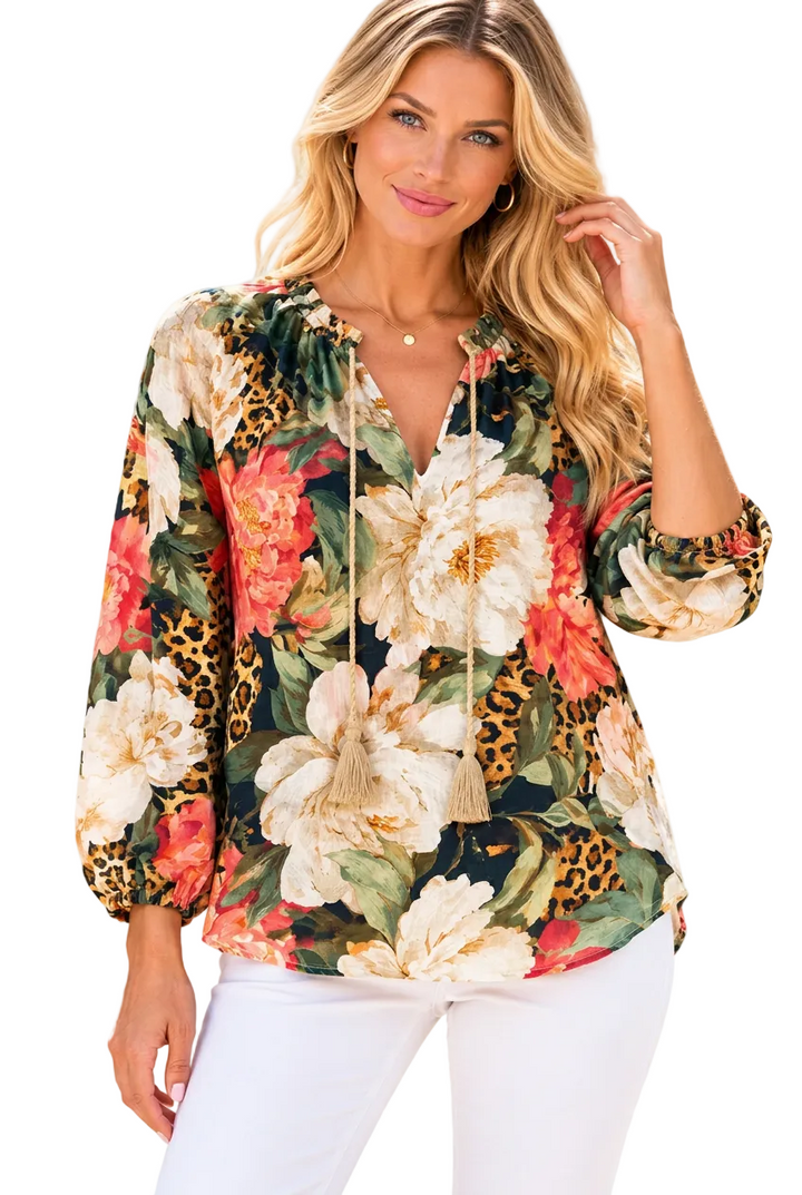 Coral floral blouse on white background
