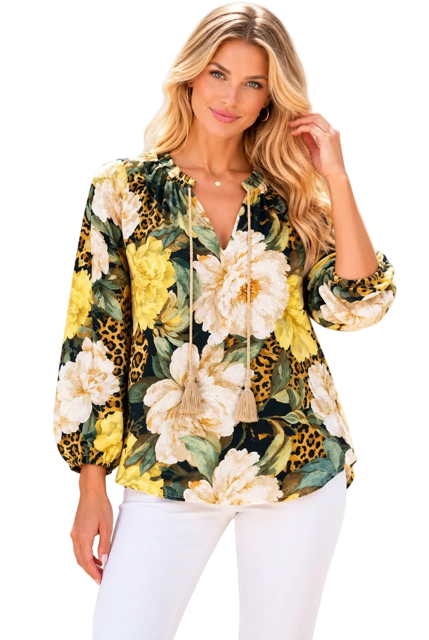 Yellow floral blouse on white background